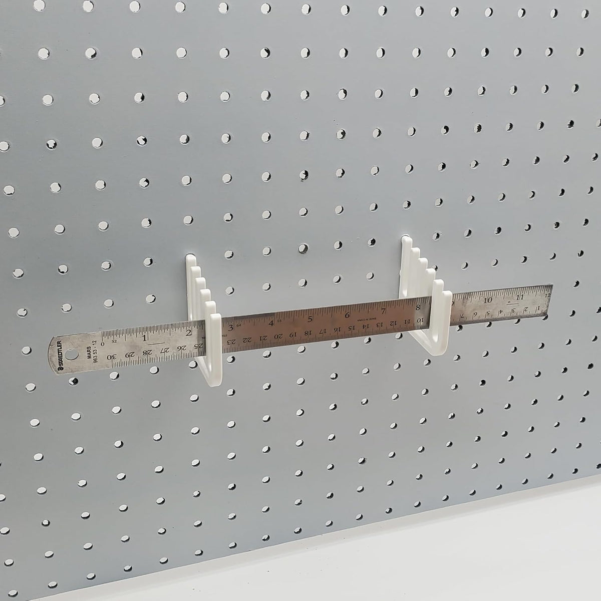 'Just Hanging' 1/4" Pegboard Ruler Storage, Compatible with 1/4"